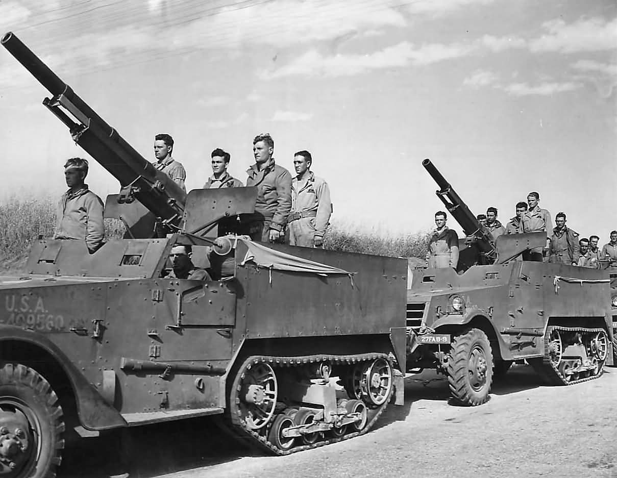 US SPG T12  75mm_GMC_M1897A4_M3  27th_Field_Artillery_Troops.jpg