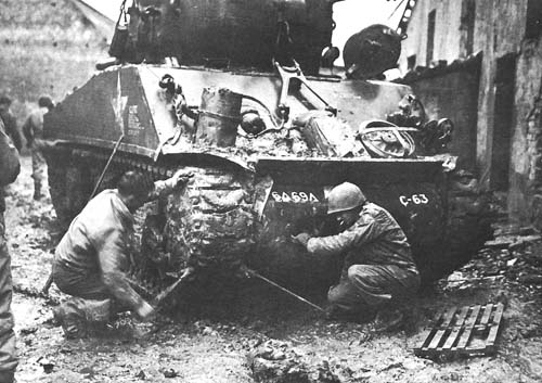 REPLACING TRACKS ON A SHERMAN TANK.jpg