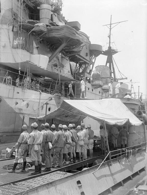 U-boat (either U-181 or U-862) moored next to the Japanese cruiser Myōkō.jpg