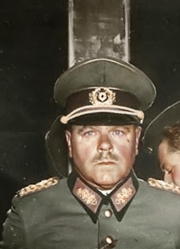 German General Anton Dostler is tied to a stake before his execution by a firing squad, Italy, 1945.jpg