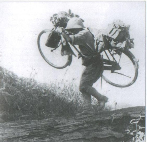 japanese_cyclist_dismount_500wide.jpg